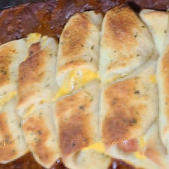 Used single cheese slices instead of string cheese.  Broiled the tops to brown them.  I added mustard to mine.  Pretty good weeknight recipe.