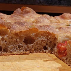 It came out perfect.
First time ever making focaccia and won't be the last. I used spelt flour but it didn't effect to the end result. The tutorial videos helped, and i mostly made it based on them. 
End result was soft and tasty with olives and mini tomatoes on the top. It had still a little crunch at the bottom and on the top. Recommend.