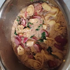 I added stewed tomato instead of diced and used Eckrich sausage.  I cooked on the stove and took 1 hour from start to finish. It great.