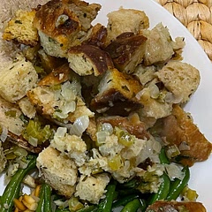 I used homemade sourdough and it was so good! I made it the day ahead and it worked just fine. This will be my go-to stuffing recipe!