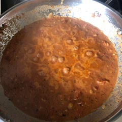 Add spices to garlic