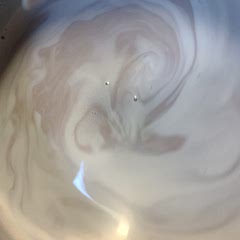 It's warming up on the stove., We added an extra tablespoon of cocoa to make a richer hot chocolate