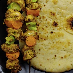 Disregarded cilantro, and only marinated for 40 minutes. Added broccoli and carrots and served with naan to make a complete meal. Squeezed lemon over the finished product. Was delicious, hubby lived it. Will make again!