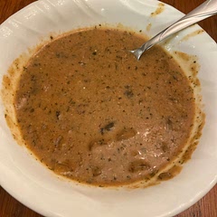 Amazing! I'm not a soup person, and we didn't use white wine.  I Plan on adding meat to it next time I make it!