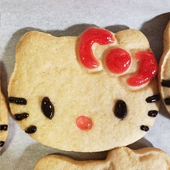 This recipe totally helped to keep the cookie cutter shape and the Hello Kitty cookies came out wonderful! I added a little bit of milk which helped them be a little more chewy and it worked wonders. I also only baked them for about 10 minutes and they were perfect