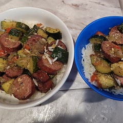 So I used beef smoked sausage, tripled the seasoning (we're a heavy seasoned household), and cut the onions and peppers smaller. I also added rice just because it was very vegetable heavy for my fiance's normal taste, but we all enjoyed it