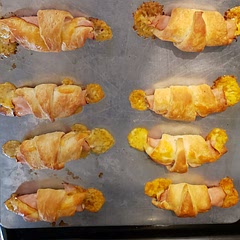 Fast, easy and awesome taste. 1 thin slice of deli cheese along with 1 thin slice of lunch meat. I tried with 2 slices of lunch meat and it was good too. However, you have to cook them about 5min longer. I might try it next time with shredded cheese to see if the cheese stays in the croissant better.