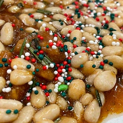 Go ahead and punch yourself in the face. You made something this good. 
Granulated sugar is necessary; no other type will do.
Sub pistachios for pine nuts and add zest of one lemon.