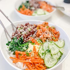 Delicious! If you don’t have garlic chili sauce, add a mixture of garlic, white or rice vinegar, chili flakes, salt, corn starch and sugar to the meat to get a similar taste. I also prefer to cook the carrots and lightly pickle the cucumbers.