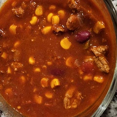 Used 28 oz crushed tomatoes instead of diced
Added 1 can of diced tomatoes and green chili's
Added 1/4 cup extra broth
Added 1 tsp of cayenne 
Served with cheese, hot sauce, and Greek yogurt