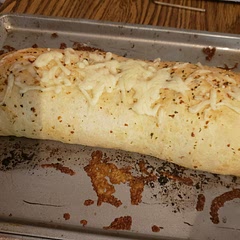 I didn't have parchment paper, but I oiled the pan and it didn't stick. I added a bit if mozz to the top for fun.
