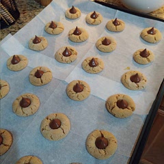 These are the most requested cookies during holiday season. It's super easy to make. The most difficult part is to unwrap hundreds of kiss chocolate-granddaughter's duty.. :)