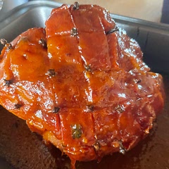I added Bay Leaves, Scallion, pimentos, Cloves and Pepper to the ham and then spruced up the glaze with:
Tang - Apple & Orange
Honey Mustard
Bbq sauce
Berties pepper sauce
One stop jerk sauce
White vinegar
Ketchup

It turned out divine!!!!!!