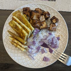I don't like I don't like ginger, so I didn't add any. Also, clearly added my own sides. I loved this sauce and tofu recipe!! Such good flavor, and neat trick whisking the flour and water.