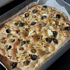 This has been my go to recipe for a while. However I didn't have rosemary tonight. Instead I added olives and feta to the top and baked. This still stands as my favorite bread recipe.