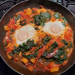 I use whatever bits and pieces of veg I have in the fridge.  
I also paprika and chilli flakes rather than fresh chilli.