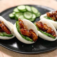 I used frozen bao sandwich buns from my local Asian market and steamed them up; since I took that shortcut this recipe came together quick. Was a hit with my kids!