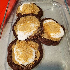 These cookies took some extra time to make because of 2 different cookie mixtures.  Delicious and worth the work
Only thing I would do differently is create a small divot in the middle for the marshmallow so it doesn't show off center