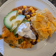 This was delicious! Seared off the chicken before adding to the baking dish, and added green onion and avocado to the garnishes... Served with gluten free cornbread