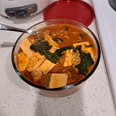 Added kale instead of spinach and threw some kimchi and ramen seasoning in there for a bit more flavor. It was super spicy but good