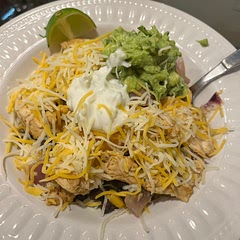 I whipped up some quick guacamole and also topped with light sour cream and some Colby jack cheese. Next time I want to marinate the chicken as it came out a little dry and slightly bland.