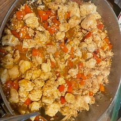 We added chopped red peppers and increased the garlic.  It has good taste but next time I would add onions. We served it over rice.