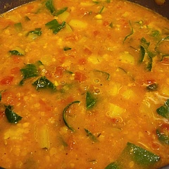 Made a few substitutions based on what I had on hand: zucchini, red lentils, and chard in place of carrots, green lentils, and kale, respectively. Delicious and hearty, great for winter.