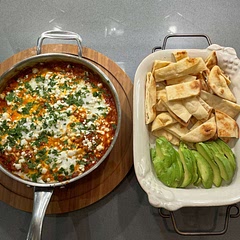 Added goat cheese on top and red pepper flakes for extra heat. A perfect recipe for a group brunch!