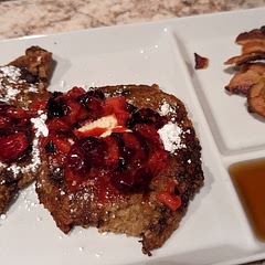 Topped with powdered sugar, crushed cranberry, blueberry, and strawberry.