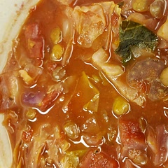 I put the dry lentils right in the pot, so it was a one-pot dish. Mine came out more red than the picture. Maybe the original author discarded the liquid from her canned tomatoes. 
