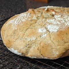 I used provencial herbs and roasted garlic, my first try making Dutch oven bread, I didn't want it too dark. My only complaints about the recipe is that my dough really didn't resemble anything I've made before for bread. But it baked well, so do not fret if you think it isn't dense enough.