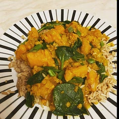 I added butternut squash and boiled this and the sweet potato first I also tweaked mine and used 3 garlic cloves 2 tsps each of garam masala, turmeric, and cumin. Served with brown rice mega tasty and healthy!