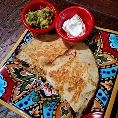 Delicious! I added shredded chicken and cumin. I also heated the bean/corn mixture before assembling the quesadillas. 