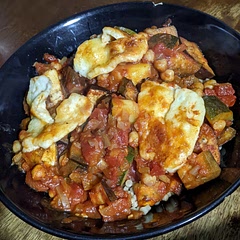 Lovely. Did 1 courgette, added half a tin of chickpeas and only half the halloumi as I was using leftovers. Simmered for 30 mins and served over couscous. Great as is but next time will add red pepper and some chilli flakes.
