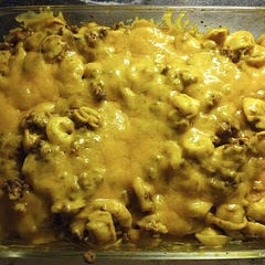 Made double portion on the stove top, used fire roasted tomatoes and a bit of extra cheese. Gave it a bit of heat. Great dish. Will be making again!
