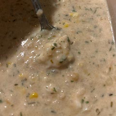 I decided to add some fresh halibut to this recipe. I also added a tablespoon of Fish Sauce (Blue Dragon brand) for a bit of added flavour. I took 3 large leftover baked potatoes and the chick peas and blended them with coconut milk (for dairy free) just until chunky. Added some frozen corn and heated until the corn thawed and the flavours mixed. Extra garlic! Delicious!! We ate it with hot buttered toast, but you could serve it with garlic bread.