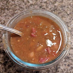 I found the recipe itself to be very bland. I used 4 cups low sodium vegetable broth, 2.5 cups low sodium chicken broth and 1.5 cups water. I used smoked ham hocks which I'll never do again — the smoked flavor added a very strange taste to the soup and I thought I'd have to throw it out, and I got very little meat from two (perhaps I was meant to use three or four but the recipe doesn't specify). I added some salt, pepper, cumin, garlic powder, and a bit of thyme leaves (I know very little about spices, I was just hoping to salvage the food at this point) and let it cook longer and it turned out okay. 