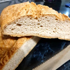 Second rise interrupted but otherwise this is an amazing GF DF bread. Got the vinegar tang of rye bread and the chewy crust of a wheat boule. Love it!