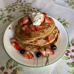 I added some strawberries and blueberries in between each pancake as well as some Greek yogurt on top🤭