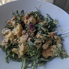 I couldn't get it to photograph well but it's delish!! I really love the sauce (although the recipe made way too much and I had to only use half). It has a little spice kick that I love but I could see it being too hot for some. I had arugula so I added that and I honestly think the recipes probably should have included some greens cause it's great with arugula. I also think I would try roasting the chickpeas next time so they get more crisp, and maybe try to broil the veggies more (instead of just roasting) so they get crisper with more color.
