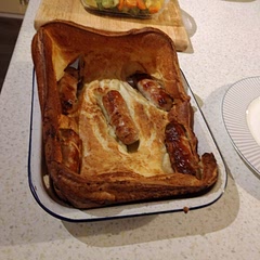 This works every time! I use ordinary pork sausages instead of the smaller kind. The art to this recipe is to make sure your Toad in the hole pan is very hot. A family favourite  served with roast potato, mixed veg and onion gravy 👍
