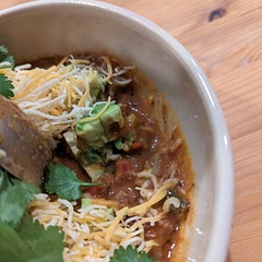 Added black beans and 1/3 cup of dry rice. So freaking good. Keeper! Topped with avocado, cheese, and cilantro.