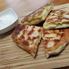 It's easy to make and delicious.
I cooked the potatoes in microwave (skin on, 6min on full power, then the skin will come off) and added some garlicky creme fraiche, that adds a bit  more flavor to it. :) 