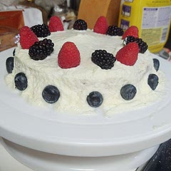 I didn't have any strawberries so I added other fruits, but it still tasted wonderful! Unfortunately I think I over mixed my batter, causing the cake to fall and be more dense instead of fluffy so this definitely isn't an easy cake in my opinion. Will just have to practice though!
