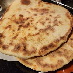 Easy and quick. Would add more salt and maybe some herbs to the dough, but it is good plain to soak up leftover cod coconut curry sauce. I halved the recipe and used sour cream instead of yogurt.