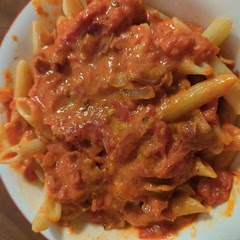 Cooked with bacon (and used the bacon grease instead of oil) and it was great. Worth the time to really let it sit and cook off all the vodka/moisture.