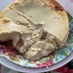I followed the recipe to the letter using some of the suggestions listed in the comments (stirring in ingredients rather than using a mixer after the sugar was creamed into the cream cheese, using a Bain marie, turning off the oven and not peeking for 6 hours, etc) and my cheesecake did not crack. I was taking it to a family gathering and was not happy when cutting into the cheesecake. The inside of the cake was not baked and was runny.  Don’t get me wrong, the taste was excellent! But I think the downfall was the cup of milk toward the beginning of the recipe. I will have to compare with other cheesecake recipes and try it again.
