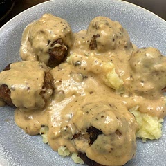 Super tasty. My family really loved this dish. I am not as fancy at plating, but I love to cook. Too much onion (and we like onions). So next time half an onion a few more breadcrumbs and one more egg. Amazing gravy!