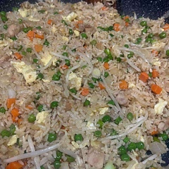 Completely amazing recipe. The only thing different I did was do peas and carrots instead of just peas and I add a little frozen corn. Do not skip the Shao Xing wine! It makes the dish
