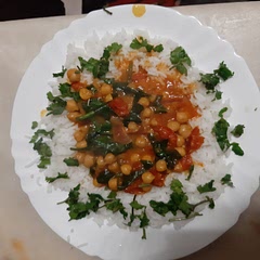 This was a nice recipe, wasy to make and very tasty.
I'll make it again for sure, needed to add a bit of brown sugar for the tomato acidity and use just a notch less of the coconut milk, I used a bit more of the spinach cause I love it, Cilantro too.